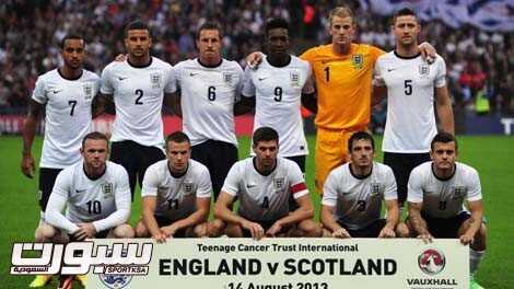 The England starting XI, (top L-R) midfielder Theo Walcott, defender Kyle Walker, defender Phil Jagielka, striker Danny Welbeck, goalkeeper Joe Hart, defender Gary Cahill, (bottom L-R) striker Wayne Rooney, midfielder Tom Cleverley, captain Steven Gerrard, defender Leighton Baines and midfielder Jack Wilshere pose for a team picture before kick off of the international friendly football match between England and Scotland at Wembley Stadium in London on August 14, 2013. England won 3-2. AFP PHOTO / CARL COURT NOT FOR MARKETING OR ADVERTISING USE / RESTRICTED TO EDITORIAL USE (Photo credit should read CARL COURT/AFP/Getty Images)