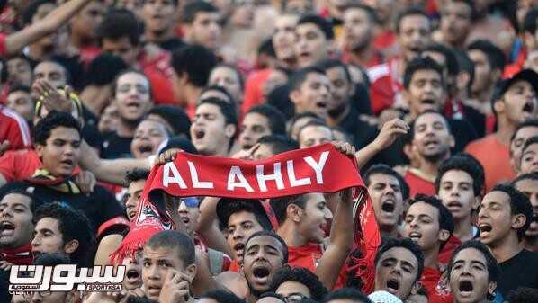 Al-Ahly fans cheer prior to their African Champions League second leg final, Egypt's Al-Ahly versus South Africa's Orlando Pirates in Cairo, on November 10, 2013. The sides drew 1-1 in the first-leg of the CAF Champions League Final on November 2 at Orlando Stadium in Johannesburg.  AFP PHOTO / KHALED DESOUKI        (Photo credit should read KHALED DESOUKI/AFP/Getty Images)