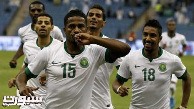 Saudi player Nasser al-Shamrani (C) celebrates with teammates after scoring a goal against Bahrain during their Gulf Cup Group A football match at the King Fahad International Stadium in Riyadh on November 16, 2014. AFP PHOTO/KARIM SAHIB        (Photo credit should read KARIM SAHIB/AFP/Getty Images)