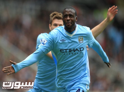 Manchester City's Yaya Toure celebrates scoring the first goal