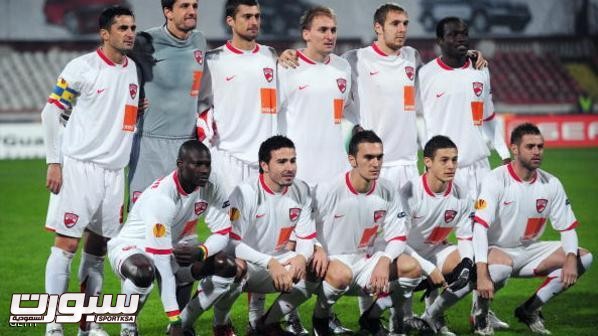 Dinamo Bucharest players pose prior to t