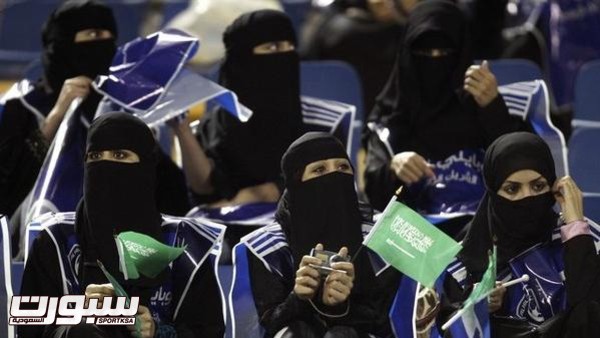 Fans of Saudi Arabia's Al-Hilal cheer during their AFC Champions League soccer match against Qatar's Al-Gharafa